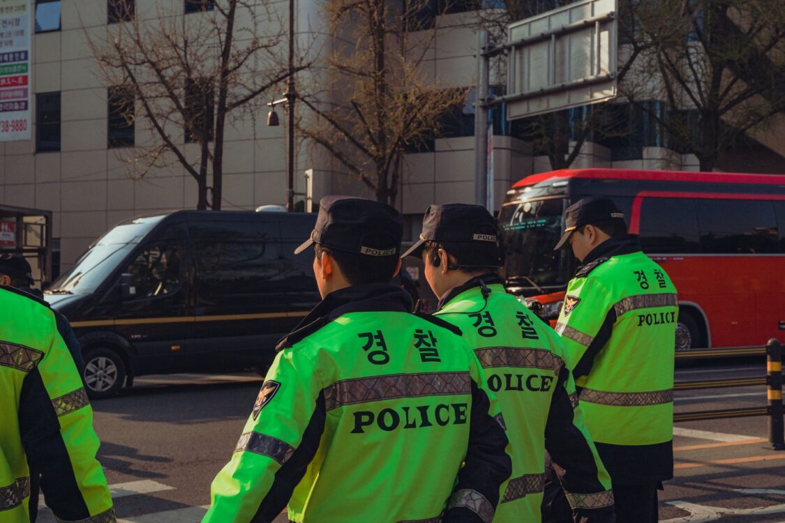 south korean police officers in seoul street